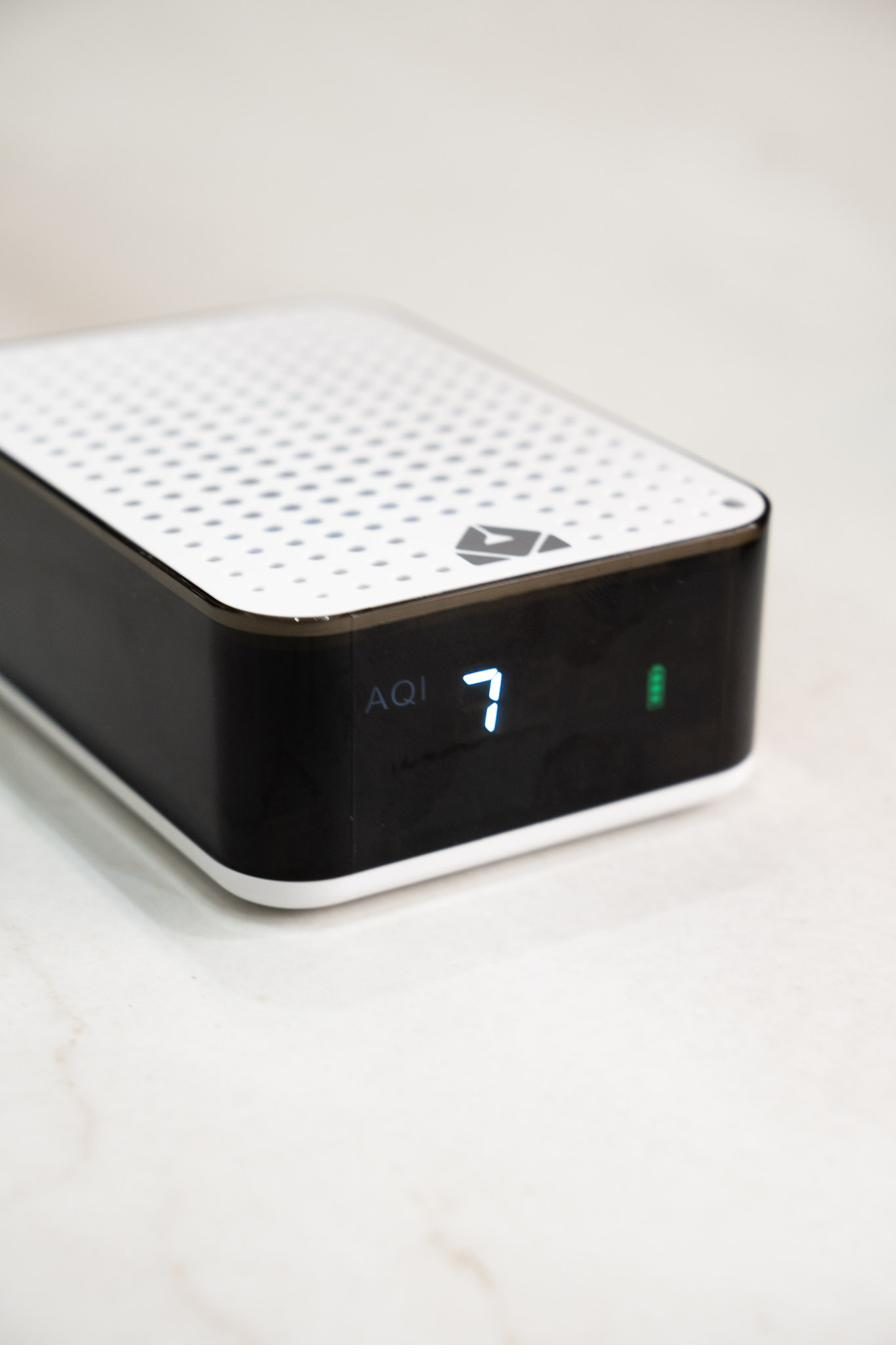 Air purifier showing an air-quality reading